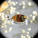 Bertrandite Tiffany stone sterling silver pendant