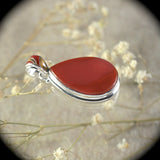 Carnelian sterling silver pendant with inlaid bail