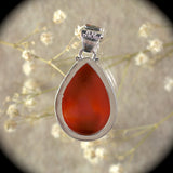 Carnelian sterling silver pendant with inlaid bail