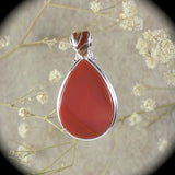 Carnelian sterling silver pendant with inlaid bail